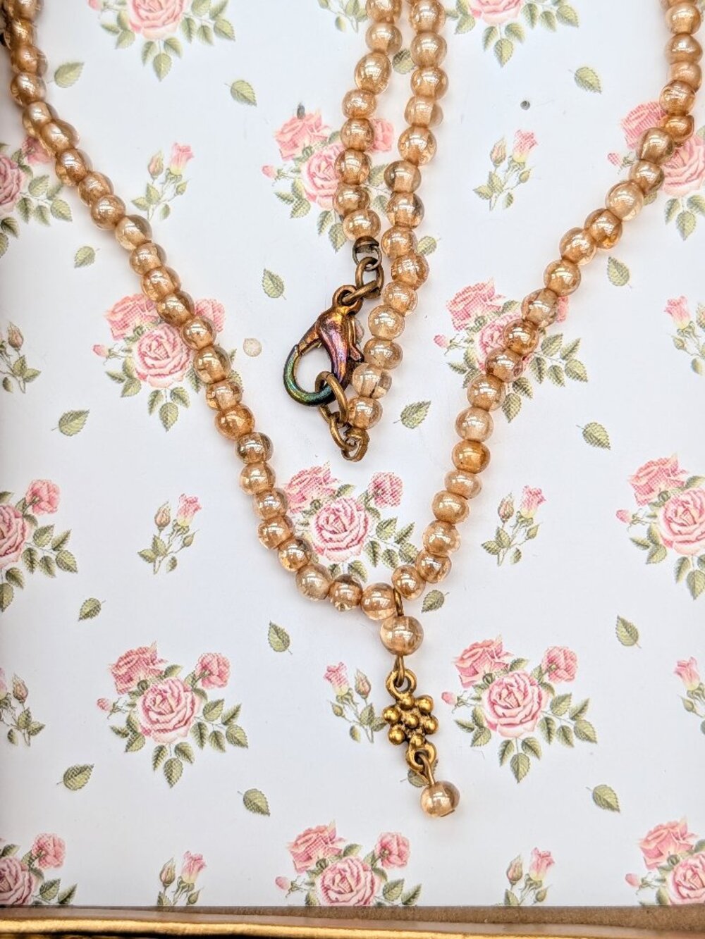 Vintage Handmade Iridescent Cream-Peach Beaded Necklace with Gold Flower detail